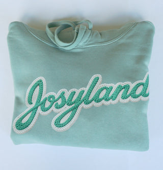 JOSYLAND Damen Cropped Hoodie aus weichem Material, schwarz, mit Kapuze und lockerer Passform, modischer Streetwear-Look